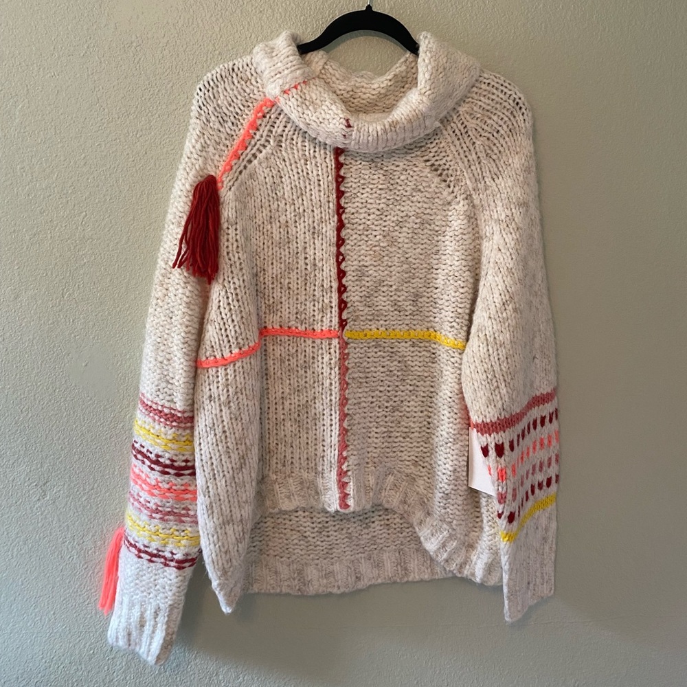 Urban Outfitters/ BDG cream knit sweatshirt with tassels